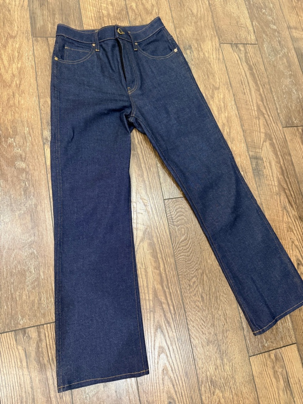 KHAITE Dark Indigo Denim Jeans with Contrast Gold Stitching
